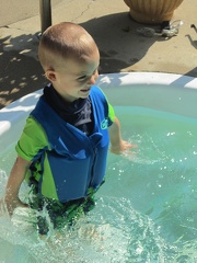Ashton playing in the water
